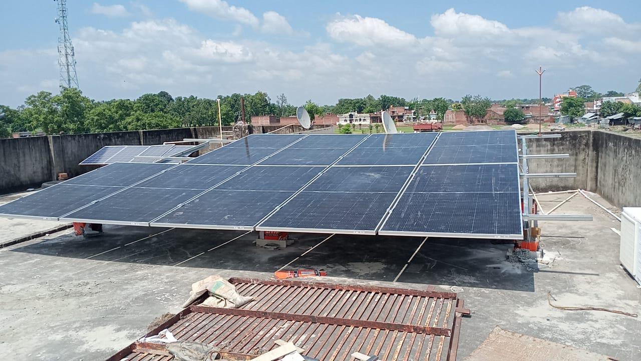 N K Enterprises team installing solar panels
